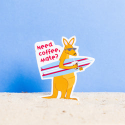 Sticker featuring kangaroo holding surf board and iced coffee.  Words say "Need Coffee Mate?" 