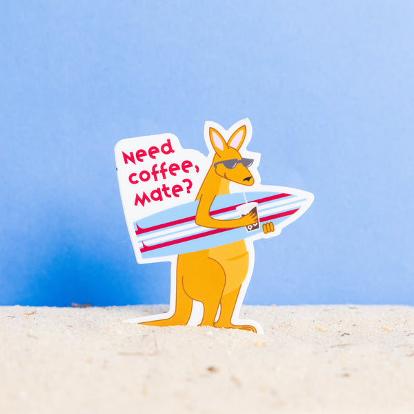Sticker featuring kangaroo holding surf board and iced coffee.  Words say "Need Coffee Mate?" 