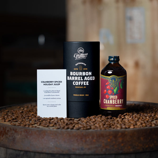 Bourbon Barrel Aged coffee with spiced cranberry syrup and a recipe card