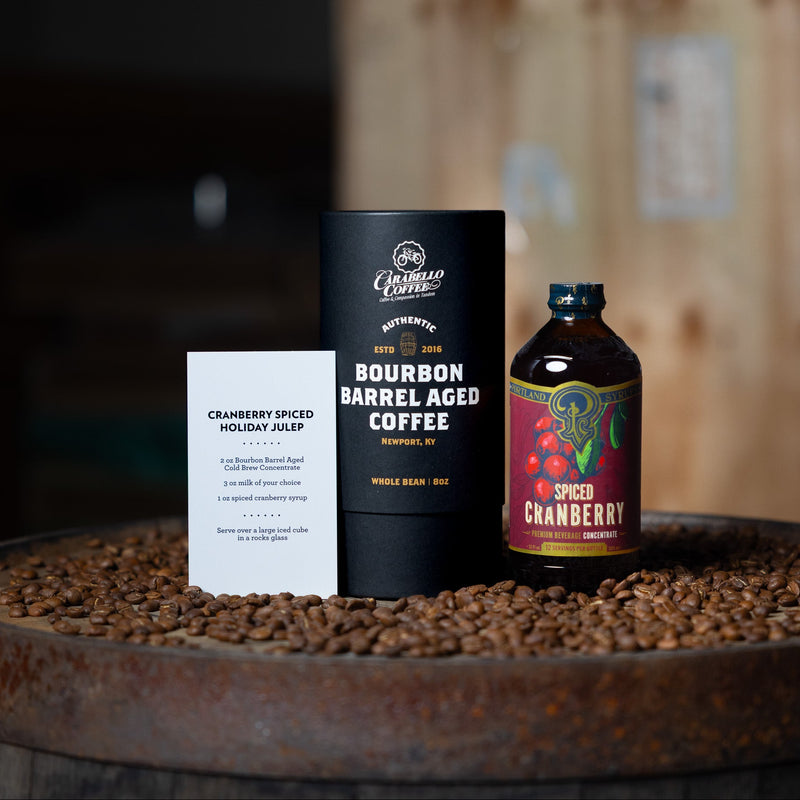 Bourbon Barrel Aged coffee with spiced cranberry syrup and a recipe card