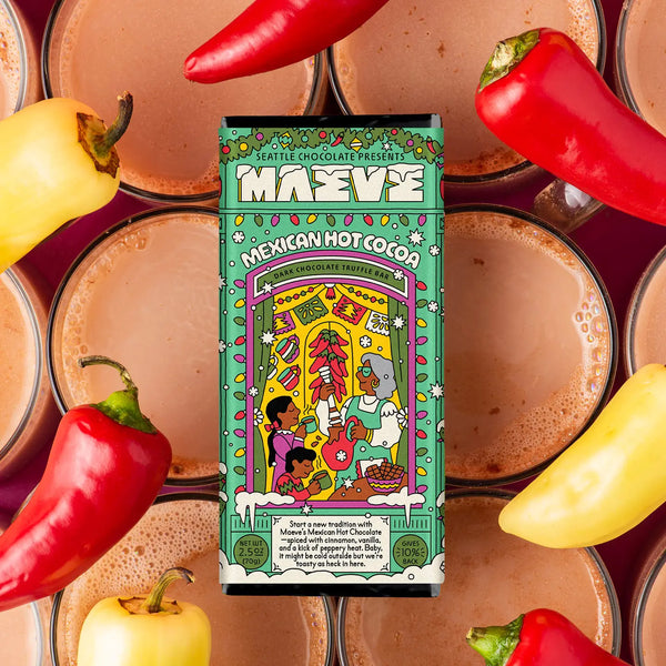 Mavee Mexican Hot Cocoa box surrounded by peppers and hot chocolate cups