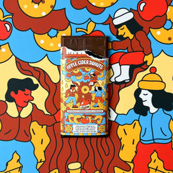 Candy bar packaging with colorful design on a stylized background