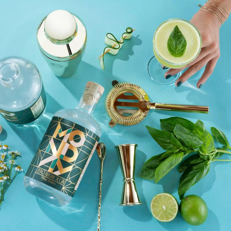 Drink Monday brand non alcoholic gin.  Mint, limes, and bar cocktail supplies 