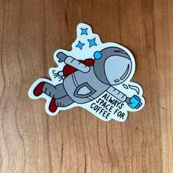 Sticker featuring an astronaut drinking coffee that says "Always space for coffee"