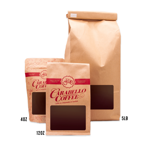 Image depicting the 3 sizes of coffee bags for this product: 4oz bag, 12oz bag, and 5lb bag. 