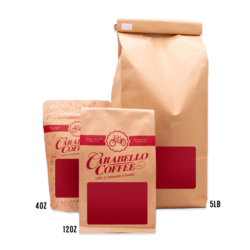 Image depicting the 3 sizes of coffee bags for this product: 4oz bag, 12oz bag, and 5lb bag. 